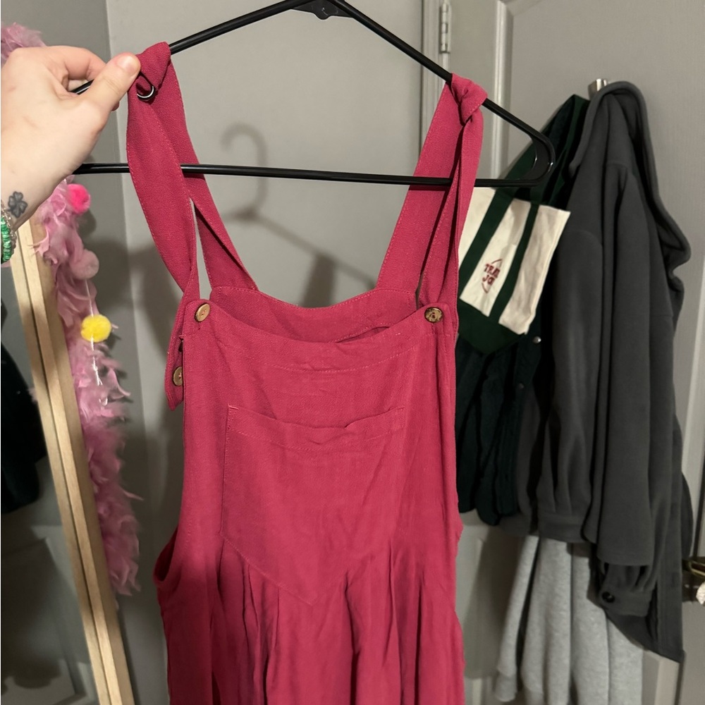 red wide leg jumpsuit with front pocket